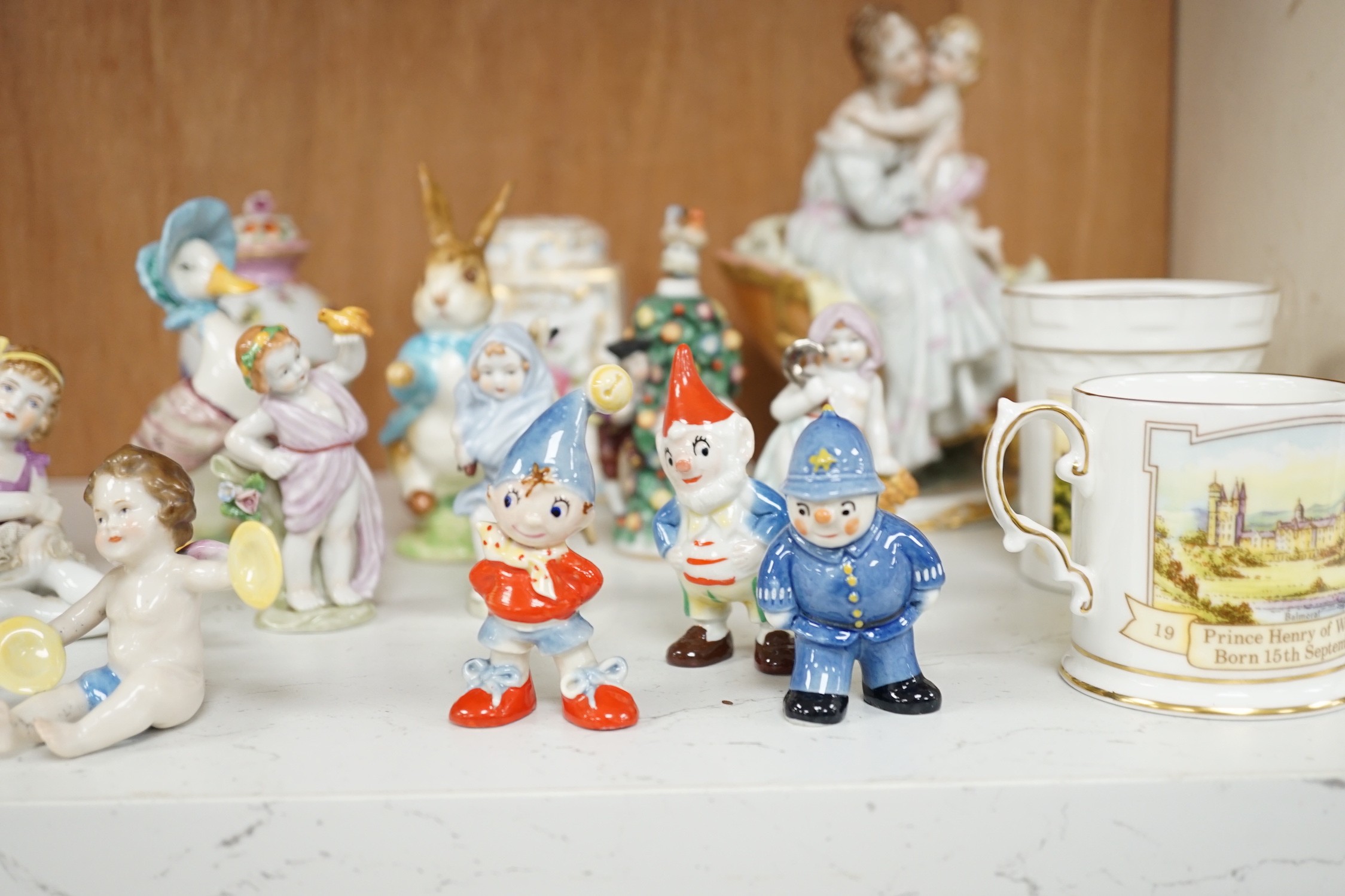 A small group of various porcelain figures etc. including Beatrix Potter and continental porcelain